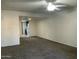 Spacious living room featuring neutral walls and carpet and an open concept feel at 1927 E Hampton Ave # 260, Mesa, AZ 85204