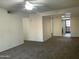 Comfortable living room with an open concept and abundant natural light coming through the windows at 1927 E Hampton Ave # 260, Mesa, AZ 85204