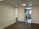 An open living space with fresh neutral walls and plush carpeting for a cozy feel at 1927 E Hampton Ave # 260, Mesa, AZ 85204