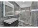 The bathroom features modern tile, a stylish vanity, and a glass shower at 1940 E Citation Ln, Tempe, AZ 85284
