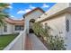 Home exterior featuring a walkway, desert landscaping, and stucco walls with a red tile roof at 1940 E Citation Ln, Tempe, AZ 85284