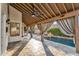 Beautiful covered patio with curtains, tile flooring, ceiling fan and recessed lighting at 1940 E Citation Ln, Tempe, AZ 85284