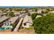 Aerial view showcasing mature trees, a backyard with grass, and proximity to the neighborhood at 19851 N 35Th St, Phoenix, AZ 85050