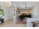 Bright living space with a piano, tile flooring, ceiling fan, and a welcoming ambiance at 19851 N 35Th St, Phoenix, AZ 85050