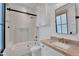 Stylish bathroom with a marble vanity top, a glass-enclosed shower, and modern fixtures at 20649 E Vallejo Ct, Queen Creek, AZ 85142