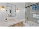 Elegant bathroom with marble countertops, gold fixtures, and a tiled shower at 20649 E Vallejo Ct, Queen Creek, AZ 85142