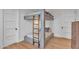 Fun bedroom with unique bunk beds and a modern ladder feature at 20649 E Vallejo Ct, Queen Creek, AZ 85142