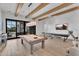 Spacious game room with pool table, shuffleboard, and outdoor access at 20649 E Vallejo Ct, Queen Creek, AZ 85142
