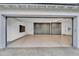 Spacious three-car garage with custom storage cabinets at 20649 E Vallejo Ct, Queen Creek, AZ 85142