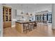 Spacious kitchen with a large island, pendant lighting, and an open layout ideal for entertaining at 20649 E Vallejo Ct, Queen Creek, AZ 85142