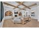 Cozy living room with a fireplace, built-in shelving, and comfortable seating at 20649 E Vallejo Ct, Queen Creek, AZ 85142