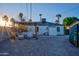 Spacious backyard showcasing a stylish pergola with swing seating, perfect for relaxing and entertaining at 2227 N 16Th Ave, Phoenix, AZ 85007