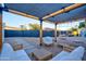 Outdoor patio featuring comfortable seating under a pergola, perfect for gatherings and relaxation at 2227 N 16Th Ave, Phoenix, AZ 85007