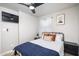 Stylish bedroom with a black metal frame bed, cozy bedding, and modern decor for a relaxing space at 2227 N 16Th Ave, Phoenix, AZ 85007