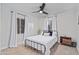 Cozy bedroom with neutral walls, plush carpet, and ceiling fan at 2227 N 16Th Ave, Phoenix, AZ 85007