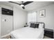 Clean bedroom featuring modern decor, a black ceiling fan, and lots of light at 2227 N 16Th Ave, Phoenix, AZ 85007