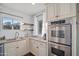 Bright kitchen featuring granite countertops, stainless steel appliances, and ample cabinet space at 2227 N 16Th Ave, Phoenix, AZ 85007