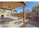 This backyard shows a large covered patio that provides space for outdoor dining and entertaining at 2341 S Gordon --, Mesa, AZ 85209