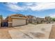 Street view of a single-story home with a two-car garage and desert landscaping at 2341 S Gordon --, Mesa, AZ 85209