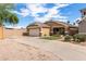 Exterior shot of a well-kept single-story home featuring a two-car garage at 2341 S Gordon --, Mesa, AZ 85209