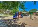 Community playground with slides, swings, covered picnic area and colorful climbing structures at 2341 S Gordon --, Mesa, AZ 85209