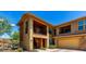 Charming townhome with two stories, stucco, beautiful stone accents, private balconies, and a two car garage at 2425 W Bronco Butte Trl # 2011, Phoenix, AZ 85085