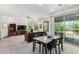 Living room and dining area with a sliding glass door to balcony at 2425 W Bronco Butte Trl # 2011, Phoenix, AZ 85085