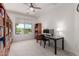 Bright office with window, built-in shelves and a sleek desk at 2425 W Bronco Butte Trl # 2011, Phoenix, AZ 85085
