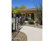 Pool access with wrought iron fencing and desert landscaping gives a secure and tranquil feel at 2425 W Bronco Butte Trl # 2011, Phoenix, AZ 85085