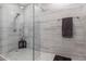 A glass shower with gray marble tiles and an overhead showerhead at 2425 W Bronco Butte Trl # 2011, Phoenix, AZ 85085