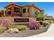 Desert Village community entrance sign with colorful landscaping at 2425 W Bronco Butte Trl # 2011, Phoenix, AZ 85085