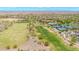 Beautiful aerial view of the community with golf course and swimming pool in a desirable gated community with mature landscaping at 27606 W Tonopah Dr, Buckeye, AZ 85396