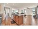 Open kitchen island overlooks the dining and living areas, creating a welcoming flow at 27606 W Tonopah Dr, Buckeye, AZ 85396