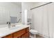 This bathroom features a single vanity, a mirror, and a toilet at 29751 N 119Th Ln, Peoria, AZ 85383