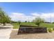 The Gilbert Regional Park sign and a glimpse of the sprawling park at 3067 E Merlot St, Gilbert, AZ 85298