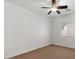 Bedroom includes a ceiling fan, neutral carpet, and ample natural light at 318 S Leandro --, Mesa, AZ 85208