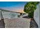Backyard featuring low-maintenance landscaping, mature trees, and fenced perimeter at 3433 E Sandra Ter, Phoenix, AZ 85032