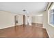 Bright bedroom with hardwood floors, mirrored closet, and natural light at 3433 E Sandra Ter, Phoenix, AZ 85032
