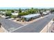 Corner lot featuring attractive single-story home with desert landscaping, rock accents, and paved street access at 3433 E Sandra Ter, Phoenix, AZ 85032