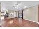 Open-concept living space featuring hardwood floors and sliding glass doors at 3433 E Sandra Ter, Phoenix, AZ 85032
