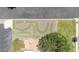 Aerial view of the putt-putt recreational facility with green carpet, surrounded by desert landscaping at 3433 E Sandra Ter, Phoenix, AZ 85032