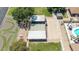 Aerial view of recreational facilities featuring a shuffleboard court, tennis courts, and a putt-putt course at 3433 E Sandra Ter, Phoenix, AZ 85032