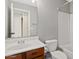 Bright bathroom featuring a vanity with a sink, toilet, shower and tub combination at 3623 E Horace Dr, Gilbert, AZ 85296