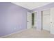 The bedroom features neutral carpet, fresh paint, an entry door, and a closet at 3623 E Horace Dr, Gilbert, AZ 85296