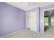 The bedroom features neutral carpet, fresh paint, an closet, and access to another room at 3623 E Horace Dr, Gilbert, AZ 85296