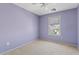 The bedroom features neutral carpet, fresh paint, a window, and ample natural light at 3623 E Horace Dr, Gilbert, AZ 85296