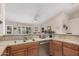 Bright and spacious kitchen featuring granite countertops and stainless steel appliances at 3701 E Morrow Dr, Phoenix, AZ 85050