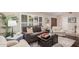 Inviting living room with a comfortable sofa, bright shutters, and elegant decor at 3701 E Morrow Dr, Phoenix, AZ 85050
