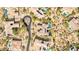 This aerial view showcases the homes, roads and overall layout of the community at 37301 N 99Th St, Scottsdale, AZ 85262