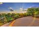 Beautiful sunset view from the backyard, highlighting desert landscaping and a serene setting at 39241 N Boulder View Dr, Scottsdale, AZ 85262